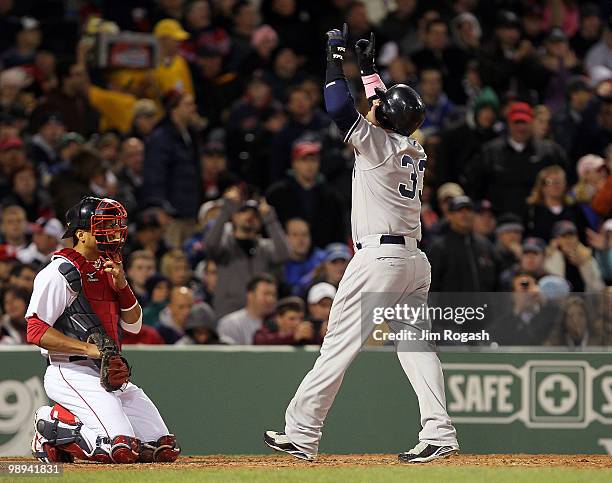 Nick Swisher of the New York Yankees reacts after hitting a home run against the Boston Red Sox at Fenway Park on May 9, 2010 in Boston,...