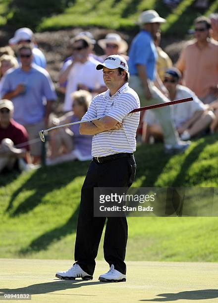 Tim Clark waits for play on the 14th green during the final round of THE PLAYERS Championship on THE PLAYERS Stadium Course at TPC Sawgrass on May 9,...