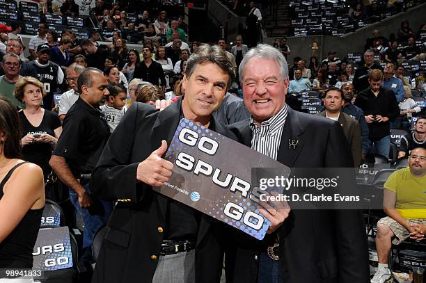 Peter Holt, Owner of the San Antonio Spurs with Rick Perry, Governor of Texas during the game against the Phoenix Suns in Game Four of the Western...