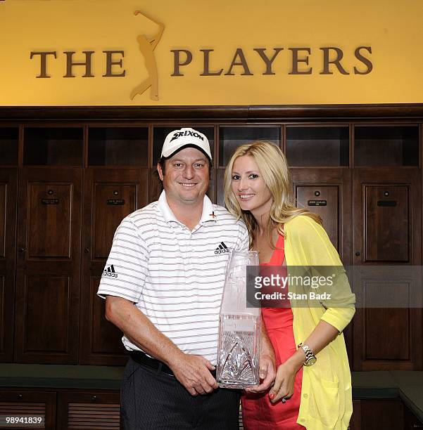 Tim Clark of South Africa poses with his wife Candace and the trophy after winning during the final round of THE PLAYERS Championship on THE PLAYERS...