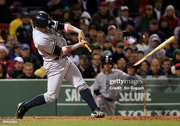 Francisco Cervelli of the New York Yankees breaks his bat against the Boston Red Sox at Fenway Park on May 9, 2010 in Boston, Massachusetts.