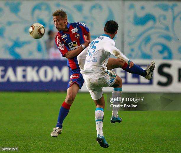 Keisuke Honda of PFC CSKA Moscow battles for the ball with Roman Shirokov of FC Zenit St. Petersburg during the Russian Football League Championship...