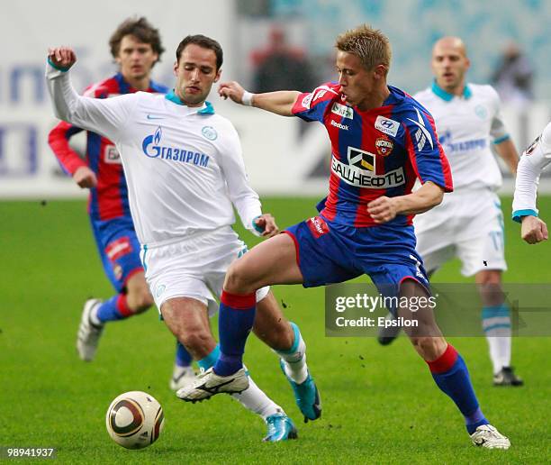 Keisuke Honda of PFC CSKA Moscow battles for the ball with Roman Shirokov of FC Zenit St. Petersburg during the Russian Football League Championship...