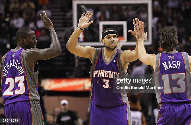 Jason Richardson, Jared Dudley and Steve Nash of the Phoenix Suns react during a 107-101 win against the San Antonio Spurs in Game Four of the...