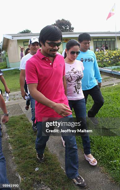 World welterweight boxing champion Manny Pacquiao, who is seeking a seat in the Philippine Congress with his party with the Nacionalista Party,...