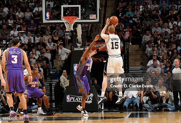 Matt Bonner of the San Antonio Spurs shoots over Channing Frye of the Phoenix Suns in Game Four of the Western Conference Semifinals during the 2010...