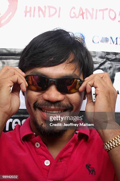 World welterweight boxing champion Manny Pacquiao, who is seeking a seat in the Philippine Congress with his party with the Nacionalista Party, is...