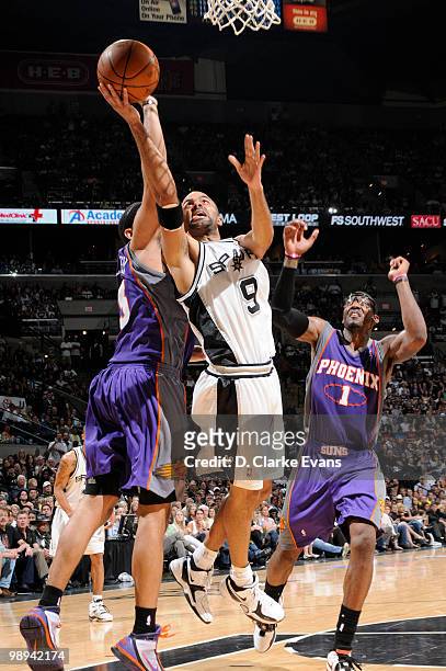 Tony Parker of the San Antonio Spurs shoots against Jared Dudley of the Phoenix Suns in Game Four of the Western Conference Semifinals during the...