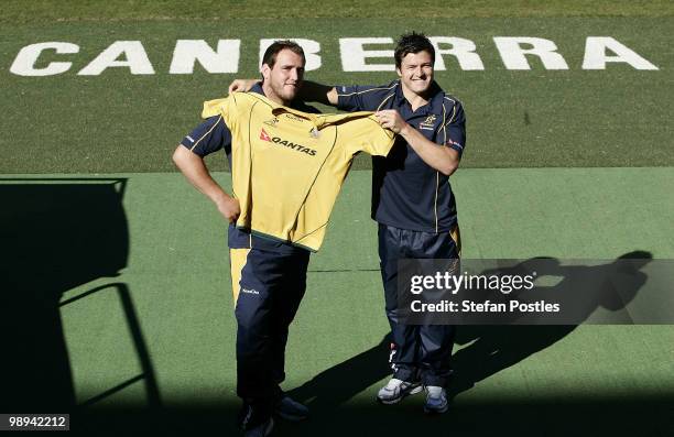 Ben Alexander and Adam Ashley-Cooper pose for photographers during an ARU press conference to announce ticket sales for the Wallabies V Fiji test at...