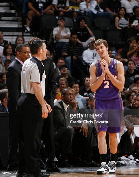 Goran Dragic of the Phoenix Suns pleads with the referee after being called for a foul during the game against the San Antonio Spurs in Game Four of...