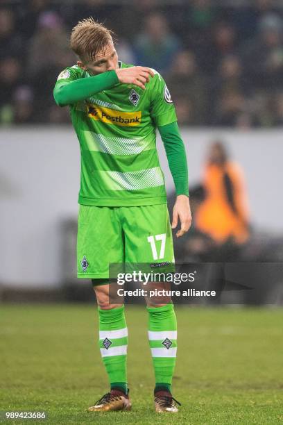 Gladbach's Oscar Wendt reacts during the German DFB Cup soccer match between Borussia Moenchengladbach and Bayer Leverkusen in Borussia-Park in...