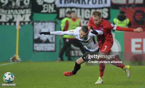 Heidemheim's Marc Schnatterer and Frankfurt's Mijat Gacinovic in action during the German DFB Cup soccer match between 1. FC Heidenheim and Eintracht...