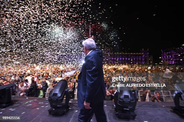 Newly elected Mexico's President Andres Manuel Lopez Obrador , running for "Juntos haremos historia" party, cheers his supporters at the Zocalo...