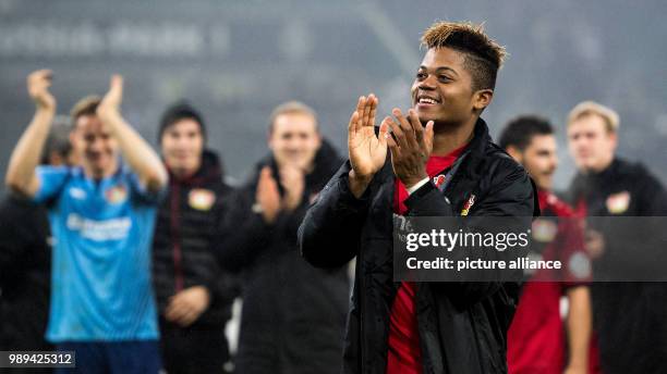 Leverkusen's Leon Bailey thanks the fans after the German DFB Cup soccer match between Borussia Moenchengladbach and Bayer Leverkusen in...