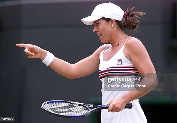 Jennifer Capriati of the USA celebrates her win against Sandrine Testud of France during the women's fourth round of The All England Lawn Tennis...