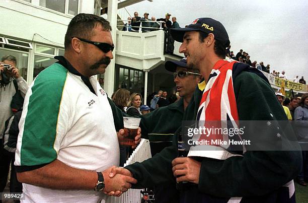 Jason Gillespie of Australia is congratulated by Merv Hughes after Australia retain the Ashes during the third day of the England v Australia third...