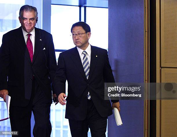 Ray LaHood, U.S. Transportation secretary, left, and Akio Toyoda, president of Toyota Motor Corp., arrive for a joint news conference in Toyota City,...