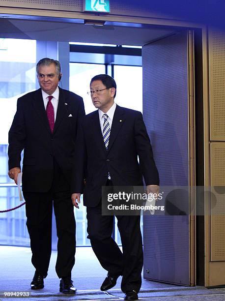 Ray LaHood, U.S. Transportation secretary, left, and Akio Toyoda, president of Toyota Motor Corp., arrive for a joint news conference in Toyota City,...