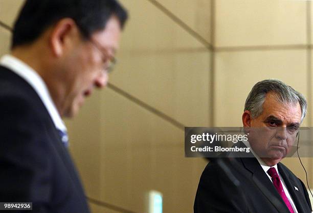 Ray LaHood, U.S. Transportation secretary, looks on as Akio Toyoda, president of Toyota Motor Corp., speaks during their joint news conference in...