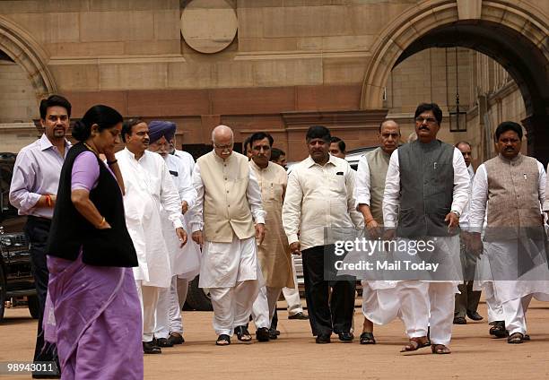 MPs Sushma Swaraj, Lal Krishna Advani, Nitin Gadkari and other leaders from both the houses coming out of Rashtrapati Bhavan after submitting a...