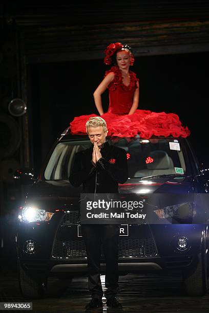 Rohit Bal is seen on the ramp at the unveiling of his Outlander Signature collection inspired by Mitsubishi Outlander in New Delhi on May 6, 2010....