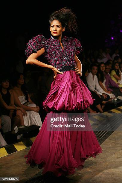 Model walks the ramp at the unveiling of the Outlander Signature collection by Rohit Bal inspired by Mitsubishi Outlander in New Delhi on May 6,...