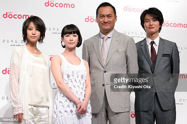 Actress Maki Horikita, singer Kaela Kimura, actors Ken Watanabe and Masaki Okada pose during the NTT DoCoMo Inc.'s new TV commercial press conference...