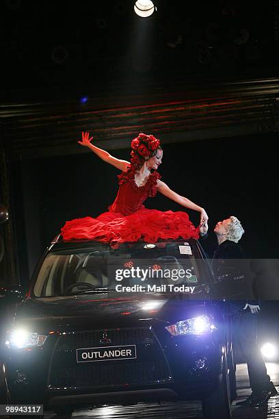 Rohit Bal is seen on the ramp at the unveiling of his Outlander Signature collection inspired by Mitsubishi Outlander in New Delhi on May 6, 2010....