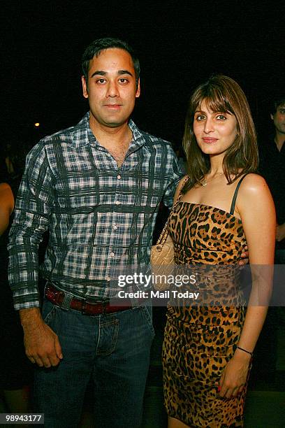 Ridhima Kapoor Sahani with husband Bharat at the unveiling of the Outlander Signature collection by designer Rohit Bal in New Delhi on May 6, 2010....