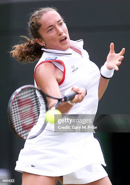 Sandrine Testud of France in action against Jennifer Capriati of the USA during the women's fourth round of The All England Lawn Tennis Championship...