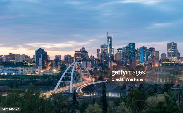 illuminated edmonton downtown - edmonton fotografías e imágenes de stock