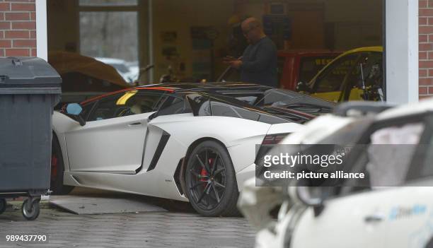 The Lamborghini of former soccer player Tim Wiese is parked at a depository of the police in Hamburg, Germany, 21 December 2017. The car was seized...