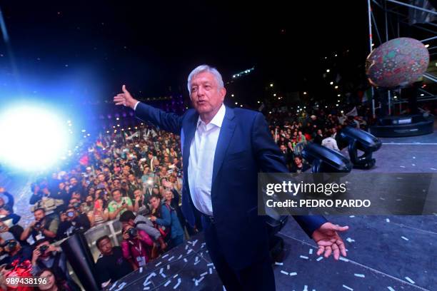 Newly elected Mexico's President Andres Manuel Lopez Obrador, running for "Juntos haremos historia" party, cheers his supporters at the Zocalo Square...