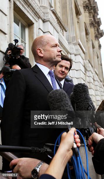 William Hague, the Conservative Shadow Foreign Secretary and George Osborne, the Conservatives Shadow Chancellor , arrive at the Cabinet Office to...