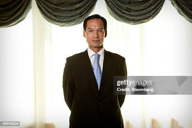 Korn Chatikavanij, Thailand's finance minister, poses for a portrait in Beijing, China, on Monday, May 10, 2010. Thailand doesn't see the need to...