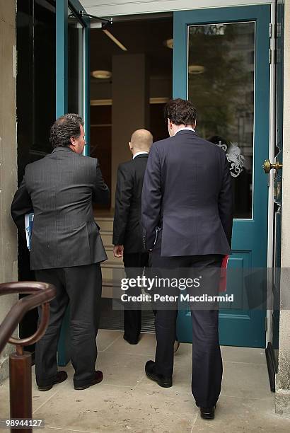 Conservative Party negotiators Oliver Letwin, William Hague and George Osborne walk into The Cabinet Office hold coalition talks with The Liberal...