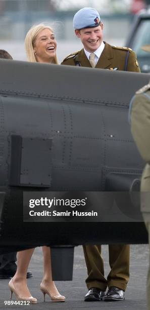 Chelsy Davy and Prince Harry smile after Prince Harry received his flying badges at the Museum of Army Flying on May 7, 2010 in Middle Wallup,...