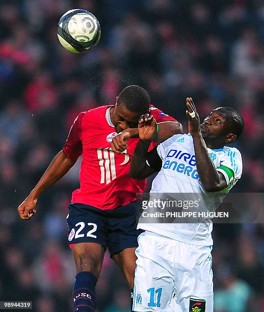 Marseille's Senegalese forward Mamadou Niang vies with Lille's Cameroun midfielder Aurelien Chedjou during their French L1 football match Lille vs...