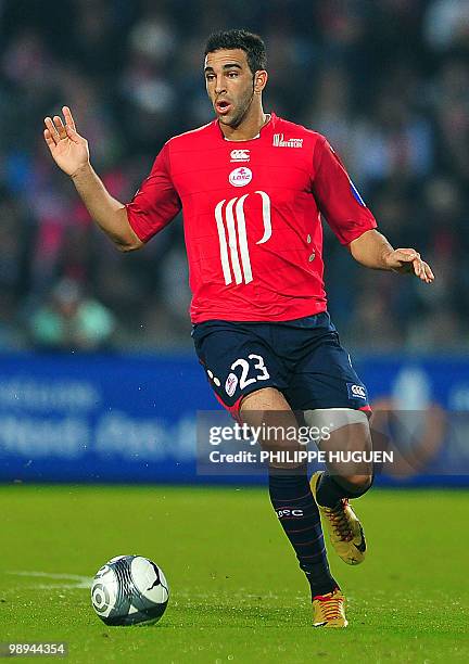 Lille's French defender Adil Rami runs during the French L1 football match Lille vs Marseille on May 8, 2010 at Lille metropole stadium in Villeneuve...