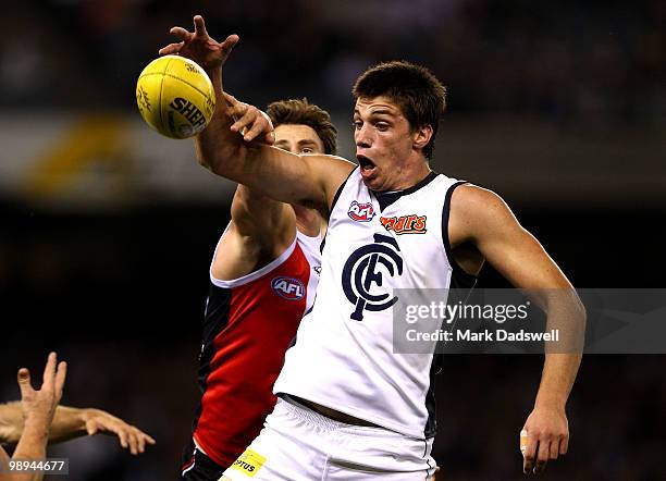 Justin Koschitzke of the Saints battles for front position with Matthew Kruezer of the Blues during the round seven AFL match between the St Kilda...