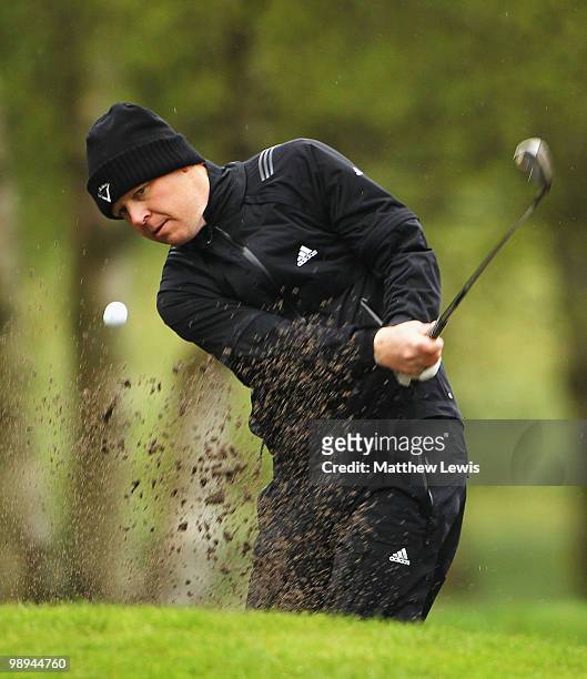 Jason Laszkowicz of Owston Hall Hotell and Golf Club plays out of the bunker on the 1st hole during the Glenmuir PGA Professional Championship...