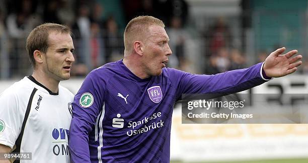 Aleksandar Kotuljac of VfL Osnabrueck and Patrick Kirsch of SV Wacker Burghausen look on during the Third League match between Wacker Burghausen and...