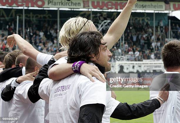 The team of VfL Osnabrueck celebrate promotion after the Third League match between Wacker Burghausen and VfL Osnabrueck at the Wacker stadium on May...