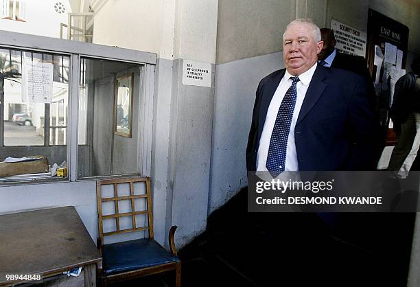 Zimbabwean Movement for Democratic Change party treasurer Roy Bennett arrives at the Zimbabwe High Court for his treason trial on May 10, 2010....