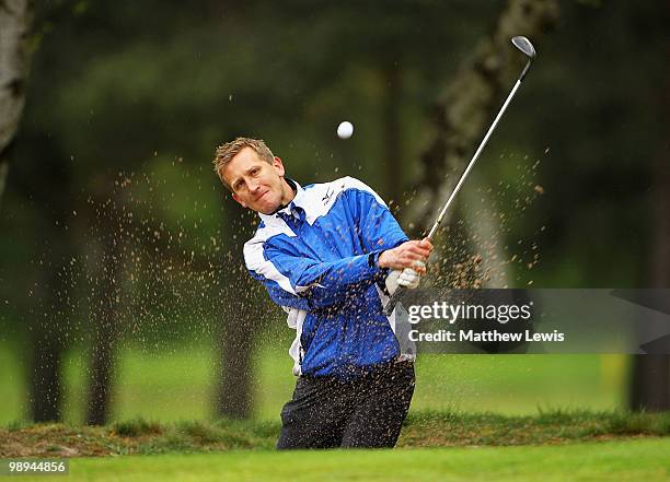 Danny Walsh of Garforth Golf Club plays out of the bunker on the 3rd hole during the Glenmuir PGA Professional Championship Regional Qualifier at...