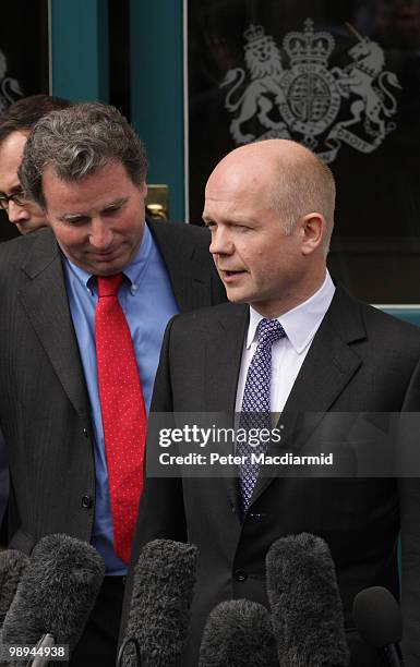 Conservative Party negotiators Oliver Letwin and William Hague talk to reporters outside The Cabinet Office after holding coalition talks with The...
