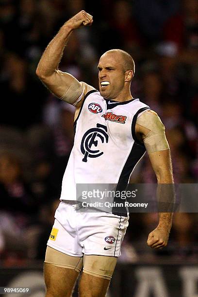 Chris Judd of the Blues celebrates a goal during the round seven AFL match between the St Kilda Saints and the Carlton Blues at Etihad Stadium on May...