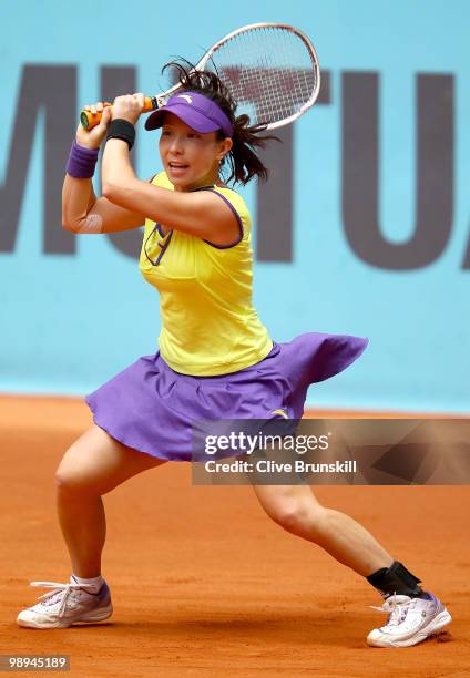 Jie Zheng of China in action against Anabel Medina Garrigues of Spain in their first round match during the Mutua Madrilena Madrid Open tennis...
