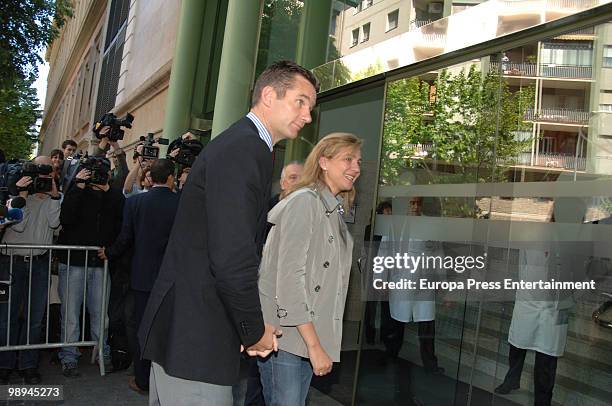 Inaki Urdangarin and Princess Cristina of Spain visit King Juan Carlos I of Spain at the Hospital Clinic after he had an operation to remove a benign...