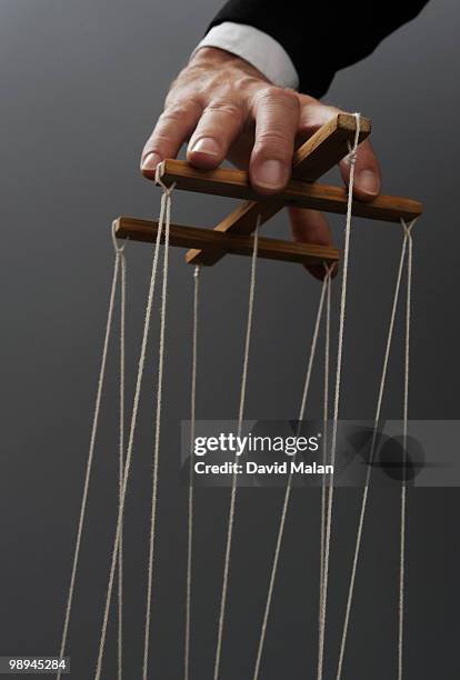 hand of puppeteer - puppeteer stock pictures, royalty-free photos & images